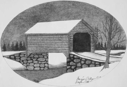A covered bridge in snow
